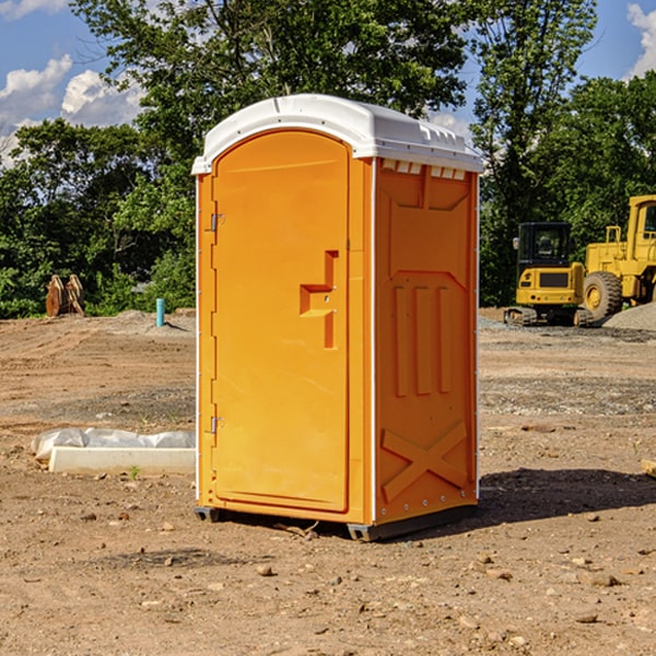 how often are the portable restrooms cleaned and serviced during a rental period in Merriam Woods